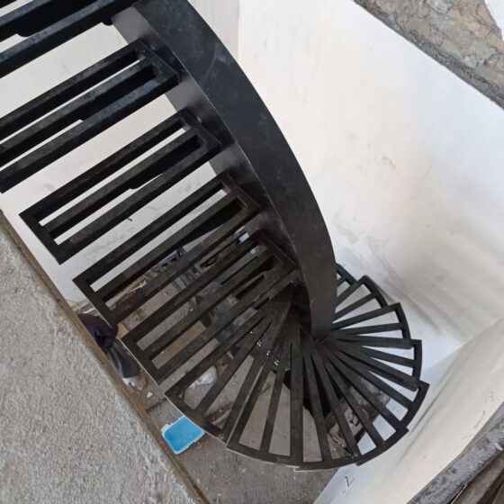Top view of custom steel spiral staircase with open tread design