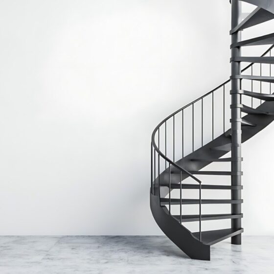 Black spiral staircase with slim balustrade in a modern living room — Staired, UK
