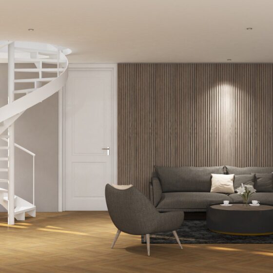 Internal spiral staircase with slim profile and continuous handrail in a modern living room