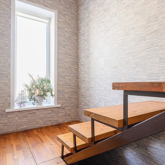 Straight wooden staircase with open riser design