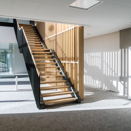Modern straight staircase with central landing option